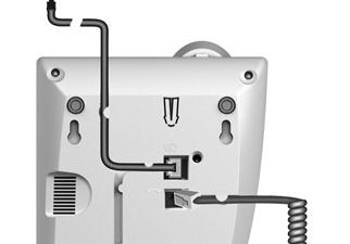 2 1 EN Wall mounting (see figure) Once the connecting leads have been connected, you can mount the telephone on the wall: Drill two dowel holes (5 mm ) 110mm apart, insert dowels and screw in
