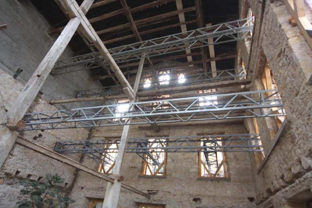 έμεινε παρούσα μέχρι τα τελευταία στάδια των εργασιών αποκατάστασης του κτιρίου και επιτέλεσε στο ακέραιο το σκοπό για τον οποίο σχεδιάστηκε.