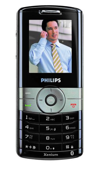 Prezentarea telefonului Pe spatele telefonului: obiectivul camerei Taste pentru volum Tastă programabilă stânga Tastă pentru răspuns Tastatură alfanumerică Microfon Ecran cu 262.