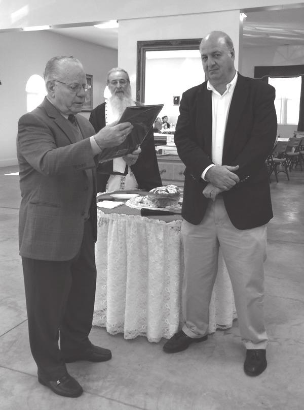 Frangos with a $5,000 donation toward AHEPA s capital campaign to help rebuild Saint Nicholas National Shrine at World Trade Center.