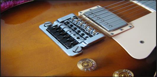 Εικόνα 1-9: Εικόνα από "non-vibrato bridge" Σώμα ηλεκτρικής κιθάρας (body of guitar) Ένα μουσικό όργανο με στερεό σώμα (solid body instrument) είναι ένα έγχορδο όργανο, όπως μια ηλεκτρική κιθάρα,