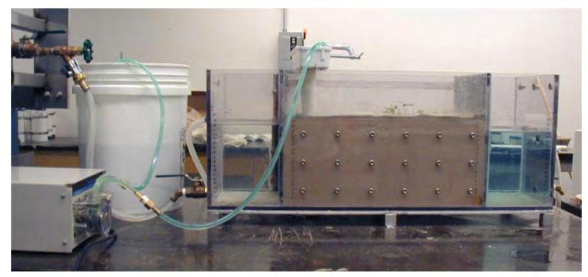 Chapter 2: Literature review of colloidal silica properties and its injectability in granular soils minutes after the test began, the CS appeared at the lateral sides of the sand and after three