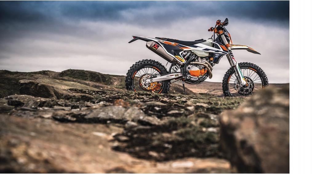 KTM POWERPARTS SELECTION OF AVAILABLE KTM POWERPARTS FOR ENDURO: Akrapovič Racing Line 12 l Fuel Tank Factory Graphics Kit Wheel Trim Ring Sticker Kit Brake Disc Guard Front Axle Puller Factory