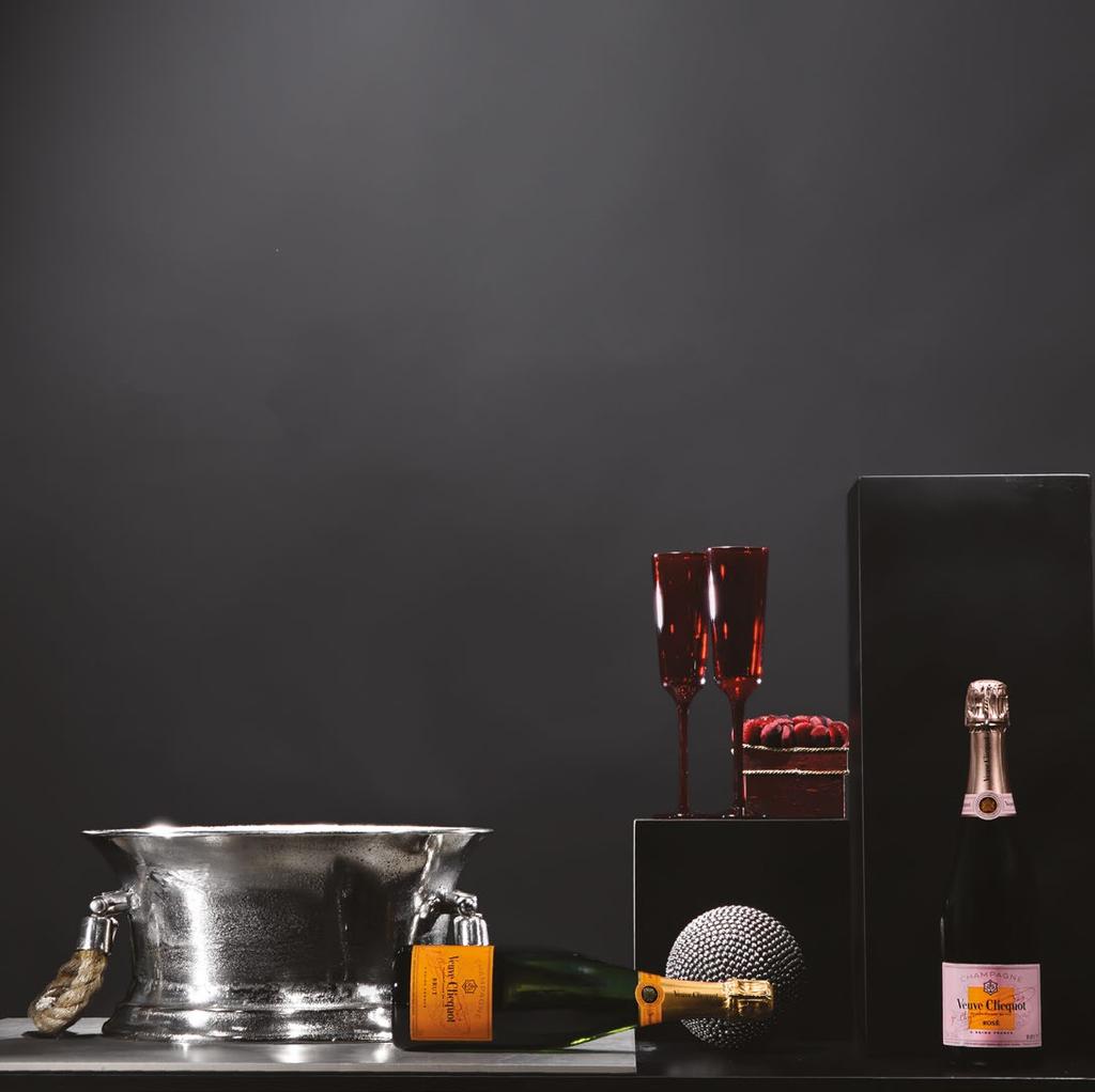06 07 Fruit Bowl with Wooden Base #1804A 1b. Hennessy Fine De Cognac 0.7lt 1b. Lagavulin 16yo 0.7lt 1b. Ciroc 0.7lt 2p. Whisky Sipping Glass 1p. Sparkles of LED lights 357.80 288.
