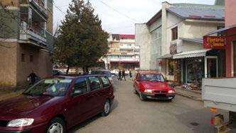2) circulație în sens opus acelor de ceasornic și profil de 2 benzi carosabile + parcare în lungul axei drumului + pistă pentru bicicliști.