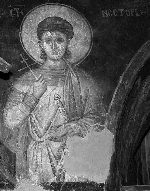 Сл. 6. Кучевиште, свети Нестор, око 1330 (снимак Д. Николовски) Сл. 7. Кучевиште, наос, северни зид, свети ратник (Ђорђе?) и арханђео Михаило; на потрбушју лука свети Орест и свети А(н)тиме(?