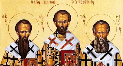 Saint Gregory and Saint Basil hold the gospel with their left hands covered by the phelonion and omophorion as a sign of special respect.