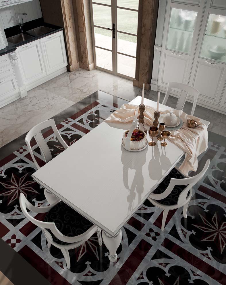 Tavolo (180 x 100 allungabile sino a 340 cm) impiallacciato e sedie Scala con seduta Cinzia nero/argento.