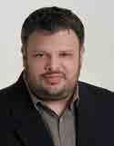 Thessalonikis (1995 1999). He is fluent in English and French.