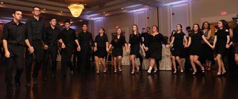A sold-out event filled with community members and guests celebrated a memorable evening.