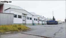 Workshops with garages and offices (760 m²). Warehouse space and offices available. Accumulation heating, connection to municipal sewer lines; water and gas prepared at border of plot.