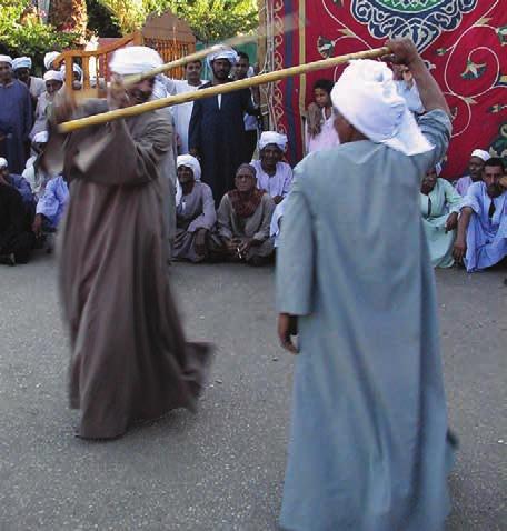 موسيقى وأداء حركي الثقافة الشعبية ربيع 2010 110 العدد ويكون بالذراع كله والعصا ويبدأ من األمام إلى الخلف أو العكس.