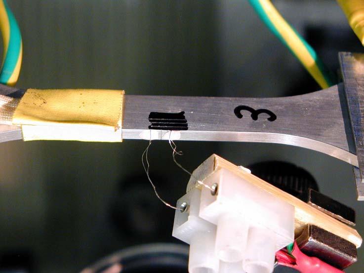 2: Specimen 3 in the resonance testing machine.
