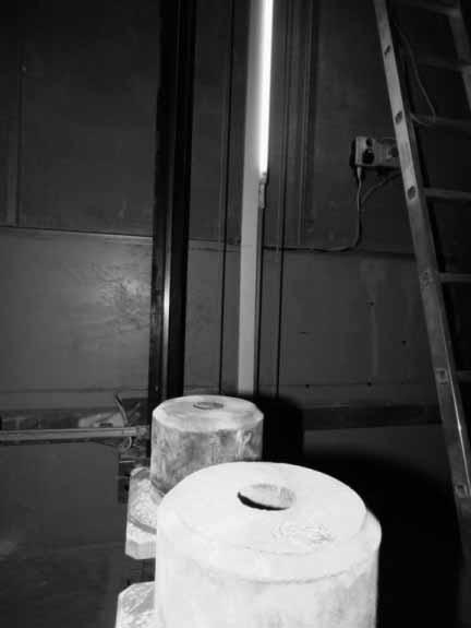A particular part is the cable, which is suspended between the cage and the elevator machinery.