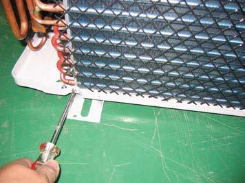 3 Heat Exchanger 1) Loosen 2 fixing screws of left and right side.