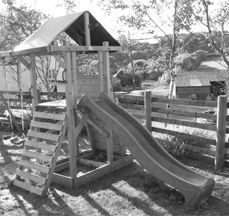 2 A girl slides from point A to point B on a plastic slide.