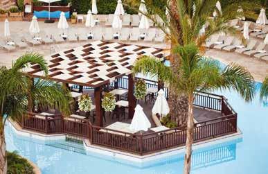 APHRODITE VENUE Αυτός ο μαγευτικός και ρομαντικός χώρος βρίσκεται μέσα στους διαμορφωμένους μας κήπους και ανάμεσα σε ευωδιαστά και πολύχρωμα ανθισμένα λουλούδια και τροπικούς φοίνικες.