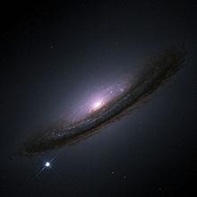 Odgovor trenutno iščemo v pojmu, ki smo ga poimenovali temna energija (dark energy), ki ji pripisujemo pospeševanje vesolja (to je v bistvu nazaj vpeljana Einsteinova kozmološka 'konstanta' lambda Λ
