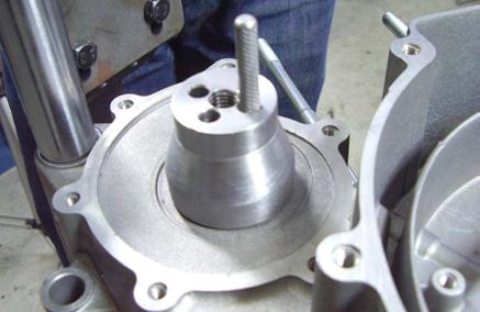 Without changing the position of the extractor, create three small holes on the