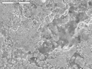 13: SEM images of the eroded morphologies of the WC/Co-Cr coating (a) At 4% slurry concentration, 4 ms