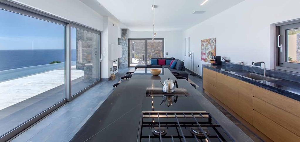 The ground floor level of the residence, undercut on its three sides, opens out towards the South offering privacy and unobstructed sea views to all interior spaces.