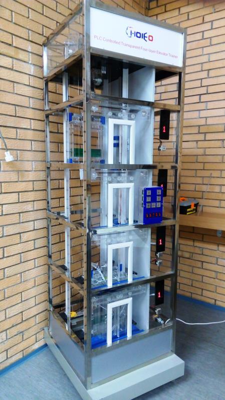 14 Modeli didaktik i ashensorit elektrik me 4 nivele Dimensionet: 700 700 x 2500 [mm] Me dhomë makinerisë Me pajisje të sigurisë Tensioni punues: 220 V, 50 Hz Me katër ndalesa.