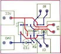 Slika 5.1: (Levo) vezje astabilnega multivibratorja in (desno) razpored elementov na testni ploščici (pogled od zgoraj in pogled od spodaj.. Slika 5.