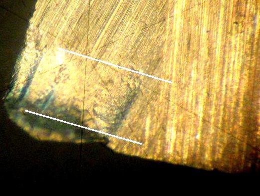 نشریه تخصصی مکانیک کاربردي دوره شماره 1 اسفندماه 1390 82 در شکل (6) تصویر میکروسکوپی از سطح آزاد ابزار که در آن پهناي آستانه فرسایش اندازه گیري شده است نشان می دهد.