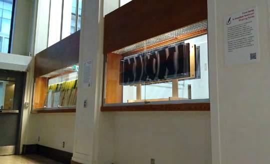 of science, the UTSIC collection was a go-to place to retrieve pieces and gather information for the installation. Image 4: Dave Kemp and Jonathon Anderson (right) and Nicole Clouston (Left).