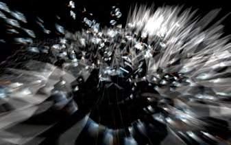 The installation creates an image of movement of the space into a forest of video planes that sculpt three dimensional space.