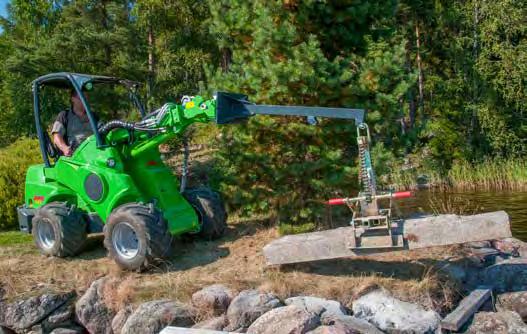 So žeriavovým ramenom (A32395) a teleskopickým ramenom nakladača je maximálny dosah 2100 mm, meraný od predného kolesa.