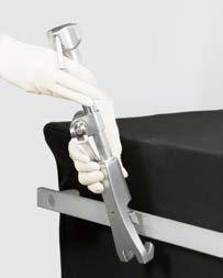 onto the rail over the sterile drape near the axilla of the