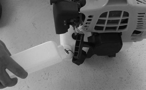 Screw the tank cap on firmly by hand.