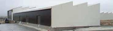 The administration and staff area is placed on two storeys in the southwest corner overlooking the production area where the final product is assembled and stacked for storage.