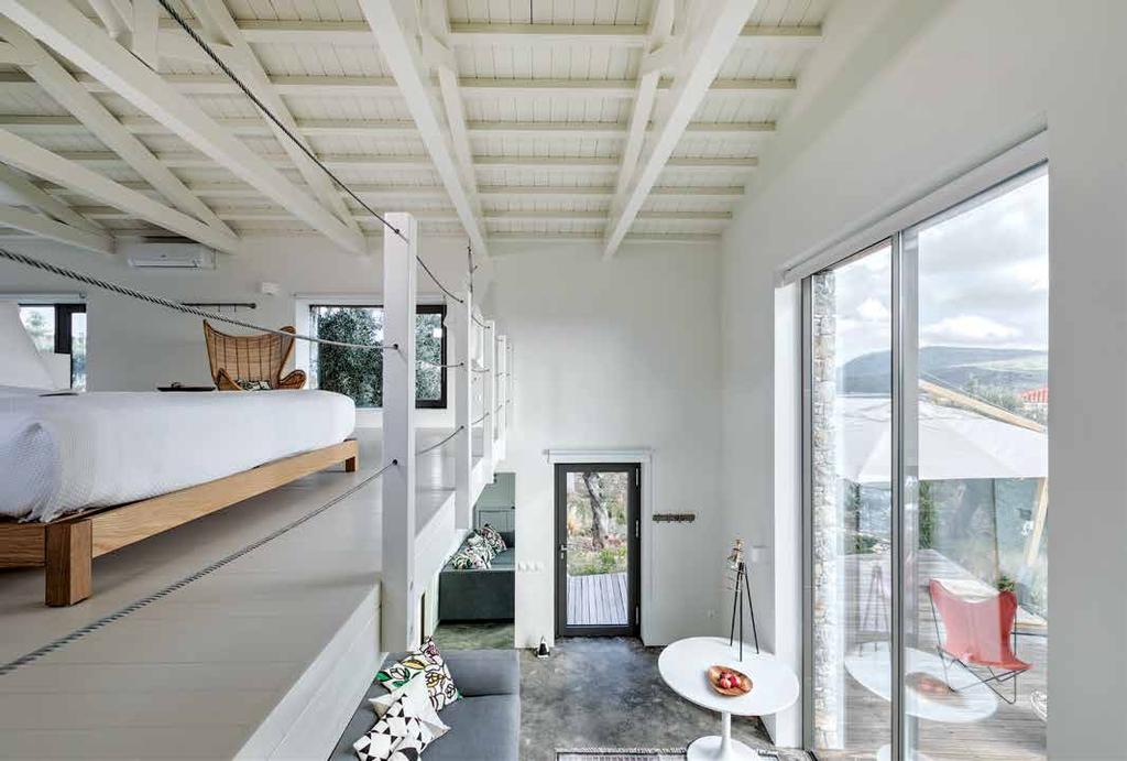 Internally, the selected blinding white shade and cement elements on floors and bathrooms create continuous, uniform and