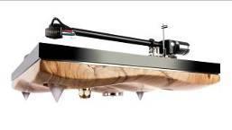 Aluminium plinth and 50mm machined curved natural Walnut for high rigidity and frequency control Vinyl