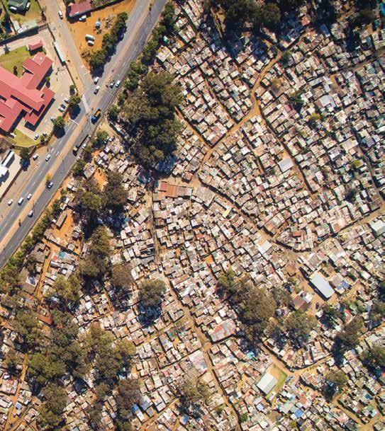 Johny Miller 77 In Johannesburg, over 35,000 people live in Makause settlement. It s built on one of the many disused gold mines that dot the city center, giving it the name City of Gold.