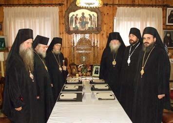 Επισκόπων Χριστιανουπόλεως κ. Χρυσοστόμου, Μεθώνης κ. Αμβροσίου καὶ Γαρδικίου κ. Κλήμεντος, Γραμματέως, συμμετεχόντων δὲ ἐκτάκτως τοῦ ἡμετέρου παρεπιδημοῦντος ἐν Ελλάδι Σεβασμ. Επισκόπου Αλανίας κ.