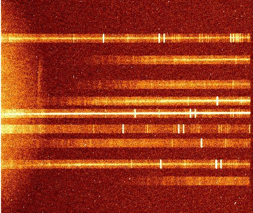 Chapter 3: EFOSC2: Multi object spectroscopy of SWIRE CDFS field 70 3.3.3 EFOSC2 Multi-Object spectroscopy Multi object spectroscopy is actually similar to normal Spectroscopy described in the previous section.