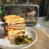 Pork shoulder ham, Edam cheese and tomato toastie, served 8 with french fries and a selection of white or wholewheat bread
